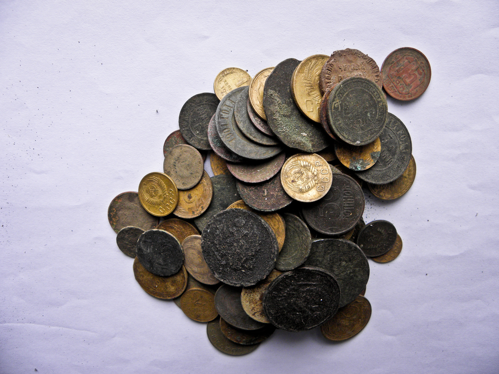 old dirty copper coins on a table