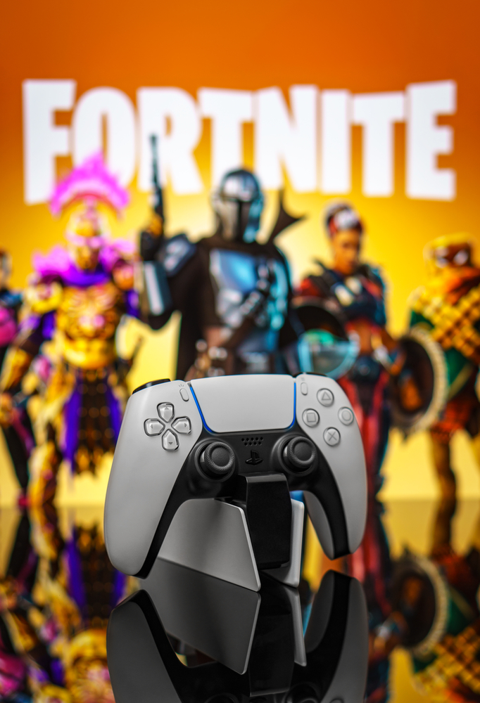 playstation controller with image that says fortnite